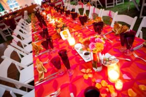 Indian fusion wedding fuchsia orange tablescape head table