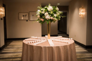 escort_card_table_tall_floral_arrangement_pink_white_green