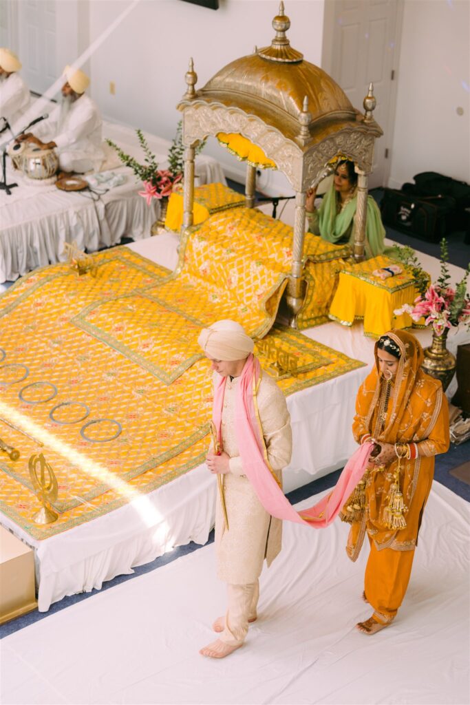 sikh-wedding-ceremony-washington-dc-gurdwara circling holy book